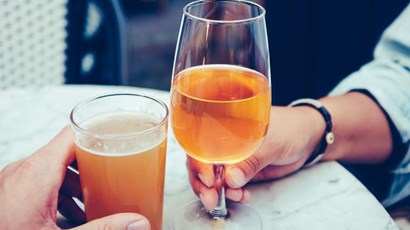 What is alcohol intolerance, and what are its symptoms?