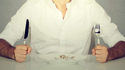 What triggers eating disorders in men?