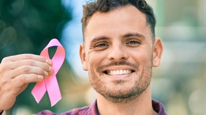 What are the symptoms of breast cancer in men? 